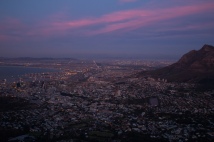 Cape Town begins to light up as the sun disappears.
